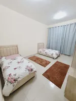 A very elegant apartment with two rooms and a hall ✅ in Ajman with a direct and complete sea view : Image 1