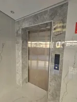 A new building with electricity and air conditioning and a completely stone facade : Image 3