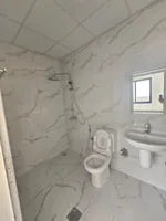 A new building with electricity and air conditioning and a completely stone facade : Image 7