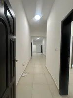 A three-room apartment, a hall and a maid's room with five bathrooms for rent in Bani Yas city, a great location close to services, a very spacious area : Image 5