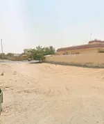 أرض زاوية ثلاث واجهات في الروضة 3 بسعر ممتاز — موقع استثماري نادر قرب شارع الشيخ خليفة : Image 5