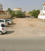 أرض زاوية ثلاث واجهات في الروضة 3 بسعر ممتاز — موقع استثماري نادر قرب شارع الشيخ خليفة : Image 6