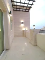 A room and a hall with a balcony for rent in Shakhbout City : Image 1