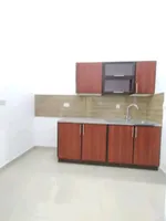 A room and a hall with a balcony for rent in Shakhbout City : Image 5