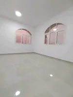 A room and a hall with a balcony for rent in Shakhbout City : Image 7