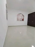 A room and a hall with a balcony for rent in Shakhbout City : Image 8