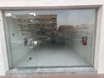 A commercial shop for annual rent in Al Rawdha 3, Ajman, strategically located near Abu Dhabi Commercial Bank, suitable for various activities with an area of 339 feet and only 4 installments : Image 1