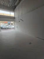 A commercial shop for annual rent in Al Rawdha 3, Ajman, strategically located near Abu Dhabi Commercial Bank, suitable for various activities with an area of 339 feet and only 4 installments : Image 2