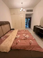 A furnished apartment with a room and a hall : Image 3
