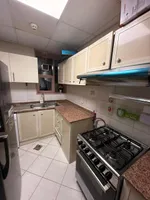 A furnished apartment with a room and a hall : Image 4