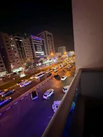 A furnished apartment with a room and a hall : Image 5