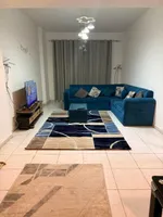 A furnished apartment with a room and a hall : Image 7