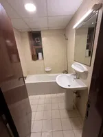 A furnished apartment with a room and a hall : Image 8