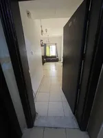 A one-bedroom apartment with a balcony, a separate hall, a large area. The address is Al Nuaimiya in Ajman, close to the exit of Dubai and Sharjah. A one-bedroom apartment with a bathroom, a balcony, a separate living room, and a large area. Located  : Image 1