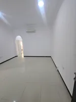Two bedrooms and a living room for annual rent in Al Shawamekh City, Abu Dhabi : Image 1
