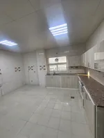 Two bedrooms and a living room for annual rent in Al Shawamekh City, Abu Dhabi : Image 2