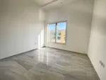 An extension of four rooms and a hall for rent in Khalifa City A : Image 2