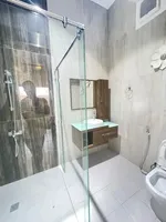 An extension of four rooms and a hall for rent in Khalifa City A : Image 5