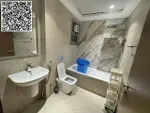 For annual rent in Ajman, a furnished room and hall with 2 bathrooms is available in Rashidiya 1 near Ghalfa Bridge and the Ambassador Market, with a balcony with an open view, a spacious area, central air conditioning with a gym and a free swimming  : Image 2