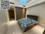 For annual rent in Ajman, a furnished room and hall with 2 bathrooms is available in Rashidiya 1 near Ghalfa Bridge and the Ambassador Market, with a balcony with an open view, a spacious area, central air conditioning with a gym and a free swimming  : Image 5