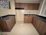 For annual rent in Ajman, two rooms, a hall with 3 bathrooms and a storage room are available in Rashidiya, 3 Ajman One towers, with a distinctive balcony with an open view, a spacious area, central air conditioning with wall cabinets, close to all s : Image 2