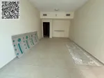 For annual rent in Ajman, two rooms, a hall with 3 bathrooms and a storage room are available in Rashidiya, 3 Ajman One towers, with a distinctive balcony with an open view, a spacious area, central air conditioning with wall cabinets, close to all s : Image 4