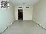 For annual rent in Ajman, two rooms, a hall with 3 bathrooms and a storage room are available in Rashidiya, 3 Ajman One towers, with a distinctive balcony with an open view, a spacious area, central air conditioning with wall cabinets, close to all s : Image 6