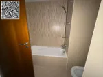 For annual rent in Ajman, two rooms, a hall with 3 bathrooms and a storage room are available in Rashidiya, 3 Ajman One towers, with a distinctive balcony with an open view, a spacious area, central air conditioning with wall cabinets, close to all s : Image 8