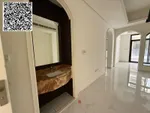 For annual rent in Ajman, a new building is available. The first resident is available. A two-room apartment, a hall, a majlis with 2 bathrooms, a balcony with an open view, a spacious area, central air conditioning, wall cabinets with a free month,  : Image 8