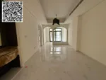 For annual rent in Ajman, a new building is available. The first resident is available. A two-room apartment, a hall, a majlis with 2 bathrooms, a balcony with an open view, a spacious area, central air conditioning, wall cabinets with a free month,  : Image 1