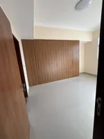 Two rooms and a hall for the first resident of Al Jerf 3 new tower for annual rent in Ajman with wall cabinets and a store : Image 5