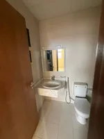 Two rooms and a hall for the first resident of Al Jerf 3 new tower for annual rent in Ajman with wall cabinets and a store : Image 6