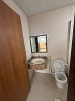 Two rooms and a hall for the first resident of Al Jerf 3 new tower for annual rent in Ajman with wall cabinets and a store : Image 7