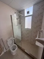 Two rooms and a hall for the first resident of Al Jerf 3 new tower for annual rent in Ajman with wall cabinets and a store : Image 8