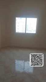 Apartment for annual rent, room, hall and balcony in Ajman on Al-Ittihad Street, Rashidiya 2/Apartment for annual rent, one bedroom, a living room, and a balcony in Ajman : Image 1