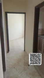 Apartment for annual rent, room, hall and balcony in Ajman on Al-Ittihad Street, Rashidiya 2/Apartment for annual rent, one bedroom, a living room, and a balcony in Ajman : Image 2