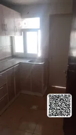 Apartment for annual rent, room, hall and balcony in Ajman on Al-Ittihad Street, Rashidiya 2/Apartment for annual rent, one bedroom, a living room, and a balcony in Ajman : Image 6