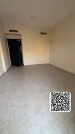 For annual rent in Ajman ♨️ A spacious room and hall with a balcony 👈 👈 Location: in Rashidiya 1 near Al Meena Tower Street : Image 4