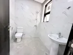 A three-bedroom apartment with a maid's room and a ground floor board in Riyadh : Image 4