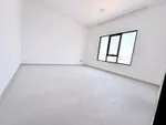 A three-bedroom apartment with a maid's room and a ground floor board in Riyadh : Image 5