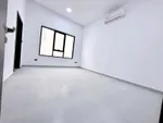 A three-bedroom apartment with a maid's room and a ground floor board in Riyadh : Image 6