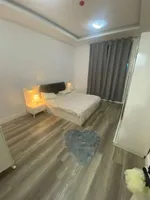 With a monthly installment of 2900 dirhams and a down payment of only 220 thousand dirhams, you will be able to own a room and a hall with furniture in the City Tower on Sheikh Khalifa Road in the center of Ajman. 📍 A very great opportunity to live o : Image 3