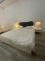 With a monthly installment of 2900 dirhams and a down payment of only 220 thousand dirhams, you will be able to own a room and a hall with furniture in the City Tower on Sheikh Khalifa Road in the center of Ajman. 📍 A very great opportunity to live o : Image 6