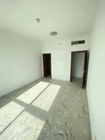 A room and a hall for sale in Al-Waha Towers, a kitchen, two bathrooms with a view of the city, a park, a swimming pool, a gym. The apartment is delivered immediately : Image 5