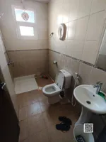 For annual rent in Al Bostan in Ajman, a unique room and hall 🏢 Clean building+ finishing before delivery 🌿 Quiet housing suitable for families/For annual rent in Al Bustan, Ajman One bedroom and living room, spacious layout 🏢 Clean building+ finishe : Image 7