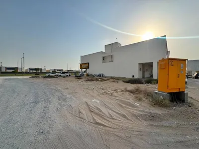 للبيع ارض تجارية في منطقة الحوشي على شارع مليحة ضاحية البديع الشارقة : Image
