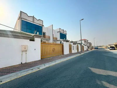 للبيع فلتين متلاصقات بمنطقة الرقيبة ضاحية السيوح الشارقة : Image