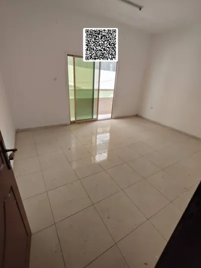شقة **غرفه وصاله** للإيجار السنوي **عجمان – النعيميه 3  ** 🏡 مناسبة للعائلات وتتميز بمساحة مريحة وموقع مميز.  قريب من محمد بن زايد   مساحه واOne-bedroom apartment for annual rent in Ajman - Al Nuaimiya 3 🏡 Suitable for families, featuring a comfortab : Image