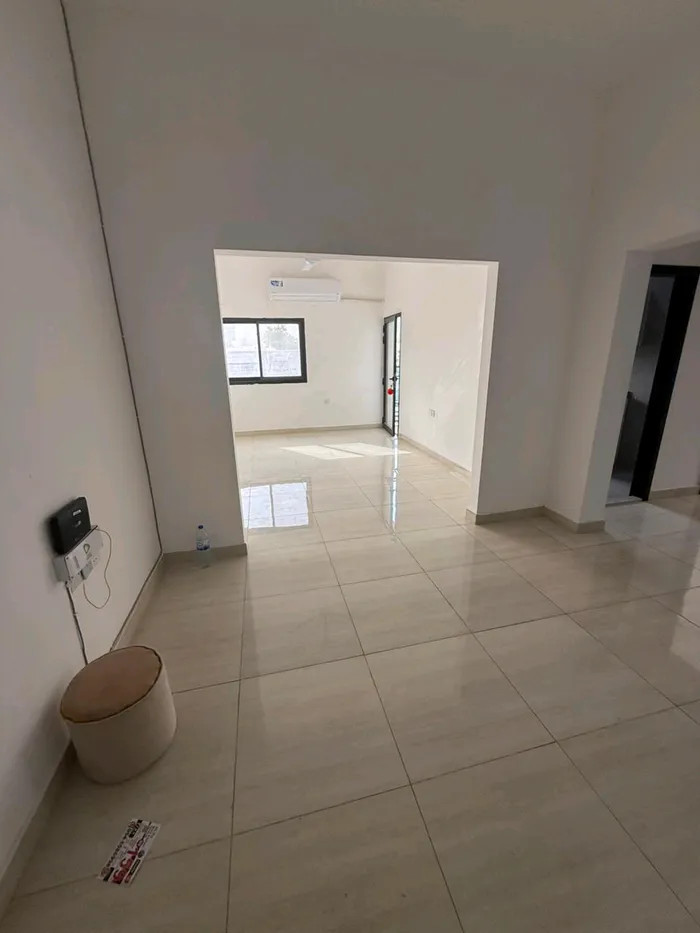 Two bedroom apartment with two bathrooms and balcony for annual rent in Al-Bostan area in front of the city police station : Image 1