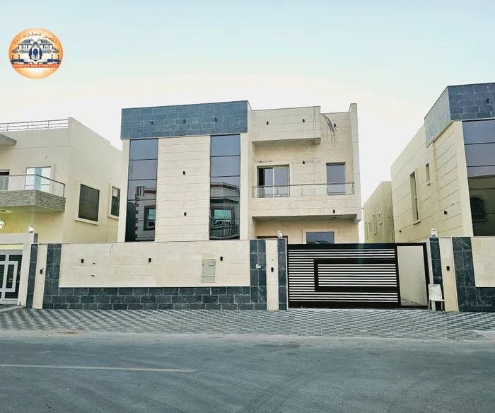 Excellent location. Villa for sale in Ajman, Jasmine area, two floors with a stone face directly on a neighbor street, with the possibility of easy bank financing. Villas of different designs : Image 1